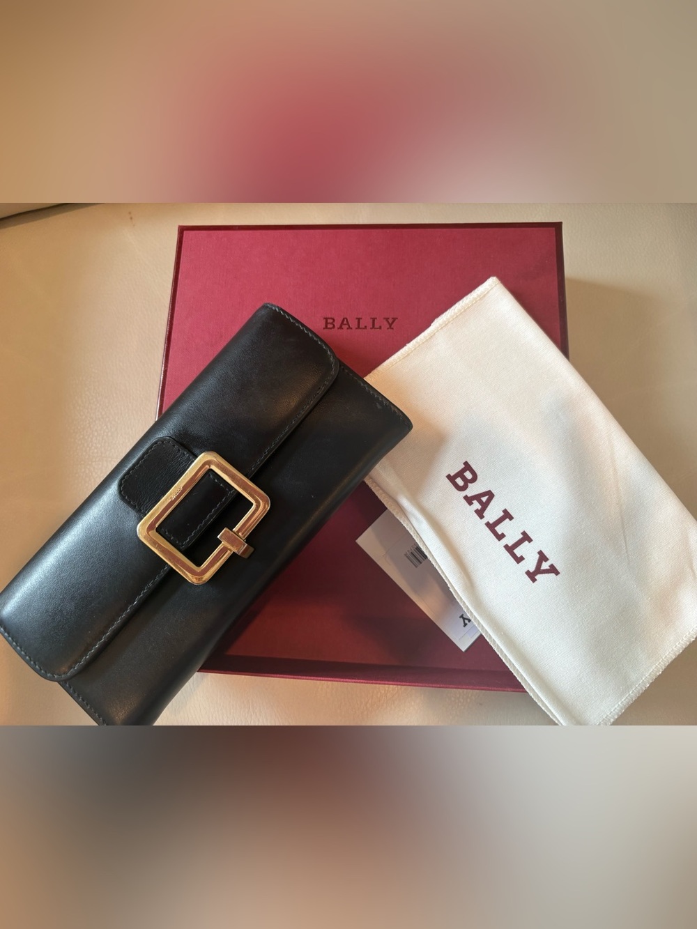 Bally Black Leather Wallet with Gold Buckle Accent